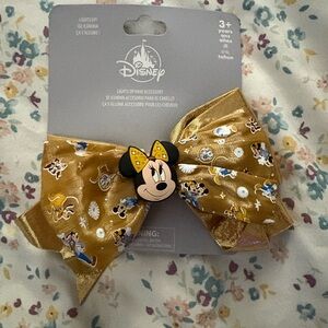 Disney Gold Minnie Mouse Bow Hair Accessory. 50 th anniversary